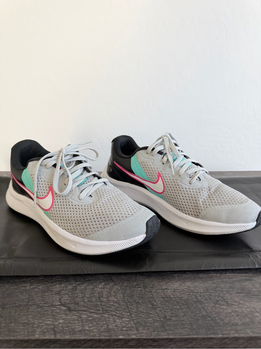 Nike Women’s Light Gray Running Sneakers with Pink & Teal Accents